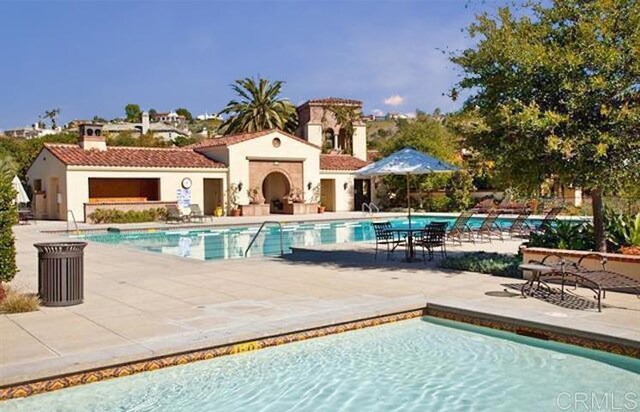 6851 Helenite Pl, Carlsbad, CA 92009 - community pool with a patio