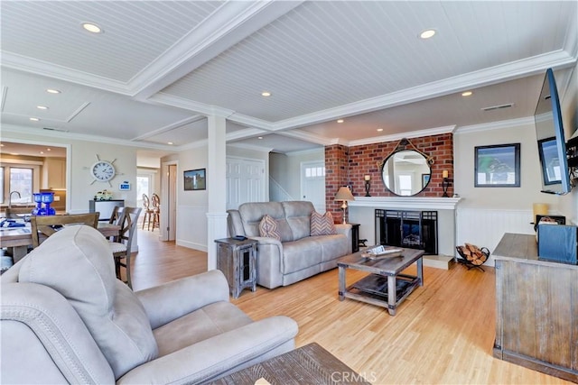 34155 Calle Ln, Primavera, Dana Point, CA 92629 - living area featuring light wood finished floors, wainscoting, recessed lighting, a fireplace, and crown molding