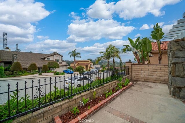 16247 Elza Dr, Hacienda Heights, CA 91745 - view of patio / terrace featuring a residential view