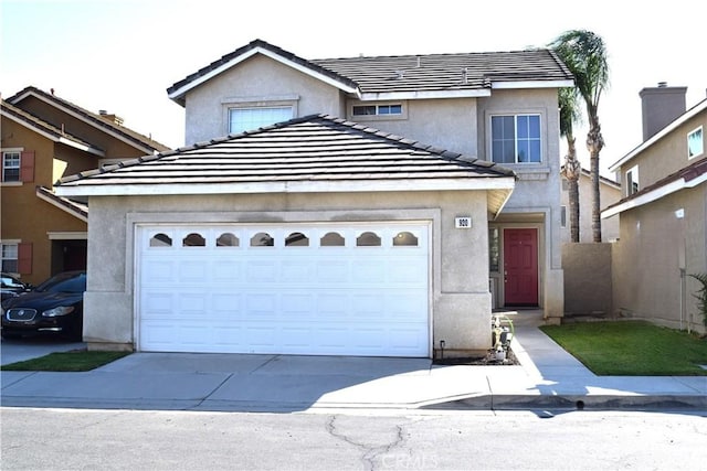 920 Nettle Ct, Corona, CA 92878 - traditional-style home with driveway, a garage, stucco siding, and a tiled roof