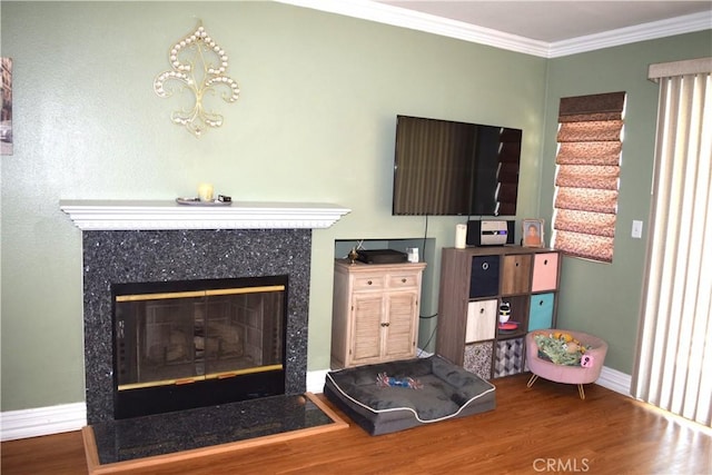 920 Nettle Ct, Corona, CA 92878 - living area featuring wood finished floors, baseboards, a tile fireplace, and crown molding