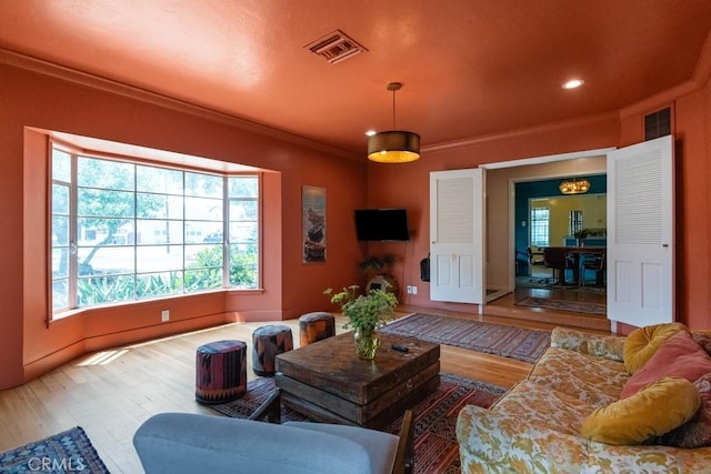 1131 S Vicentia Ave, Corona, CA 92882 - living area featuring wood finished floors, crown molding, and recessed lighting