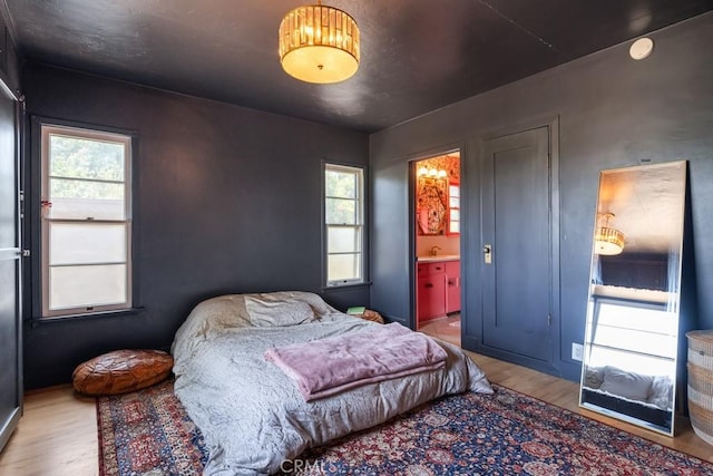 1131 S Vicentia Ave, Corona, CA 92882 - bedroom with wood finished floors and ensuite bath