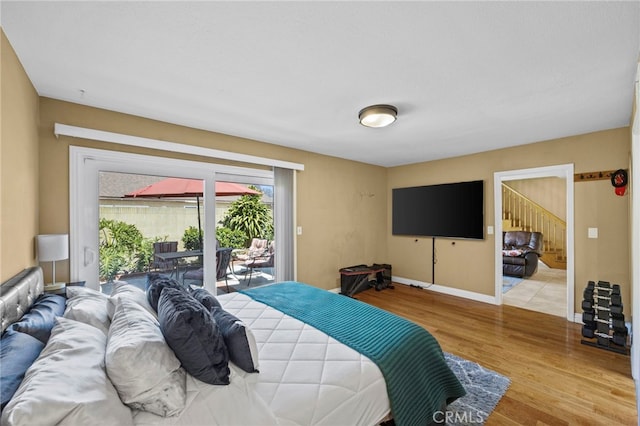 19518 Nancy Cir, Cerritos, CA 90703 - bedroom featuring access to exterior, wood finished floors, and baseboards