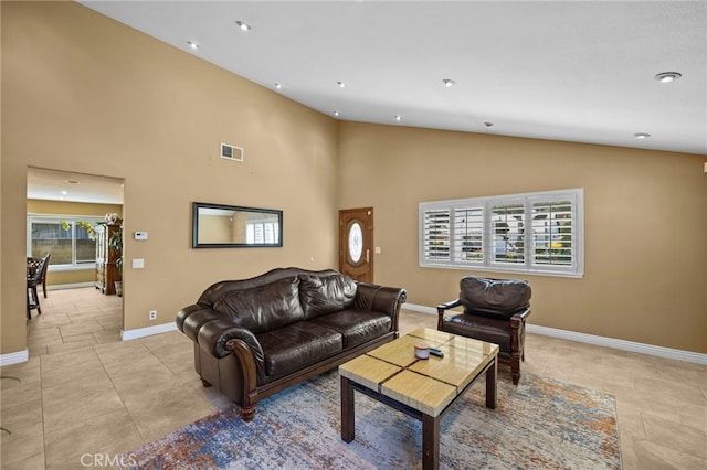 19518 Nancy Cir, Cerritos, CA 90703 - living area with baseboards, recessed lighting, high vaulted ceiling, and light tile patterned floors