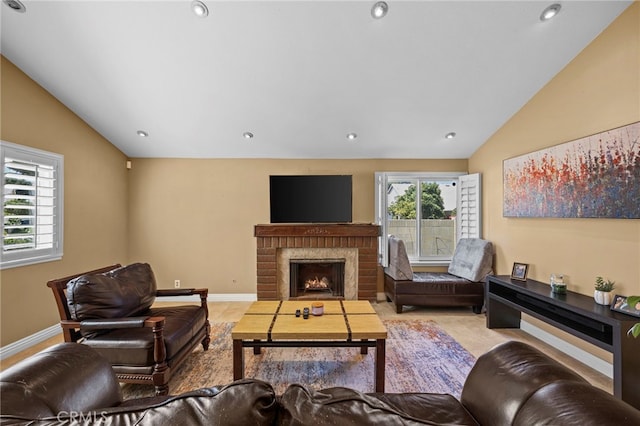 19518 Nancy Cir, Cerritos, CA 90703 - living area featuring vaulted ceiling, a brick fireplace, baseboards, and recessed lighting