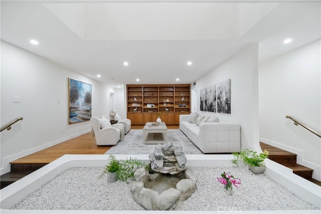 2545 Scenic Ridge Dr, Chino Hills, CA 91709 - living area with stairs, wood finished floors, recessed lighting, and baseboards