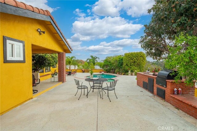 2545 Scenic Ridge Dr, Chino Hills, CA 91709 - view of patio with an outdoor pool and outdoor dining space