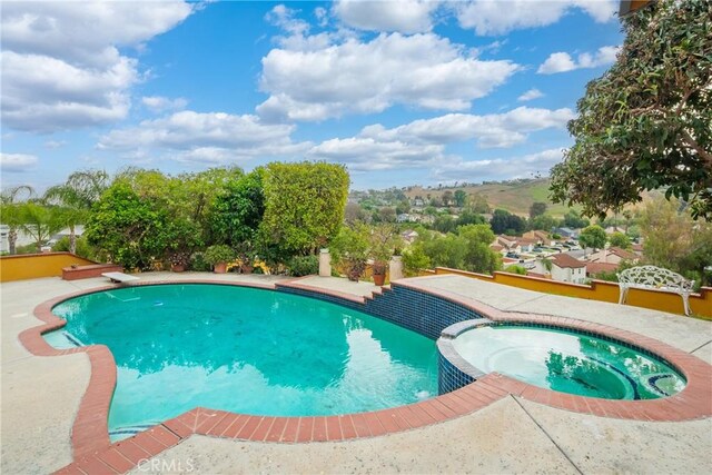 2545 Scenic Ridge Dr, Chino Hills, CA 91709 - view of swimming pool with a pool with connected hot tub