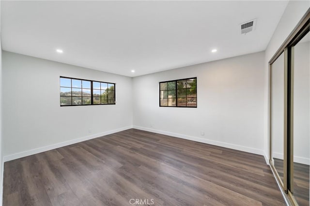 2545 Scenic Ridge Dr, Chino Hills, CA 91709 - unfurnished bedroom with dark wood-style floors, recessed lighting, baseboards, and a closet
