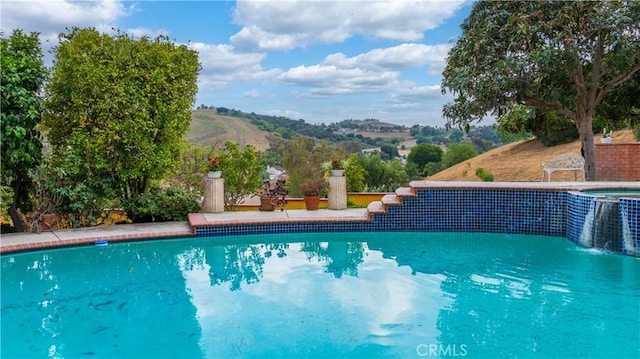 2545 Scenic Ridge Dr, Chino Hills, CA 91709 - view of pool with central AC, a mountain view, and a pool with connected hot tub