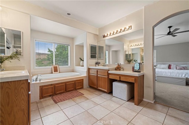 27625 Mariposa Ln, Castaic, CA 91384 - ensuite bathroom with tile patterned floors, two vanities, and a bath