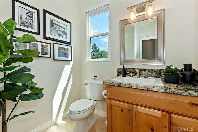 942 Lucerne Ln, Lake Arrowhead, CA 92352 - bathroom with vanity, toilet, baseboards, and tile patterned floors
