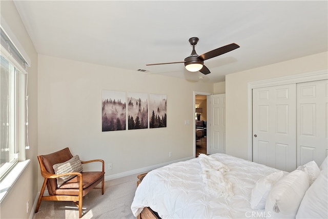942 Lucerne Ln, Lake Arrowhead, CA 92352 - bedroom with baseboards, a closet, light colored carpet, and a ceiling fan