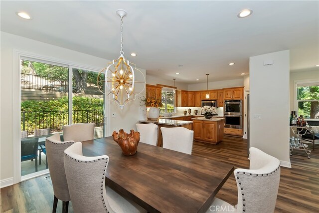 942 Lucerne Ln, Lake Arrowhead, CA 92352 - dining area with recessed lighting, dark wood-type flooring, a chandelier, and baseboards