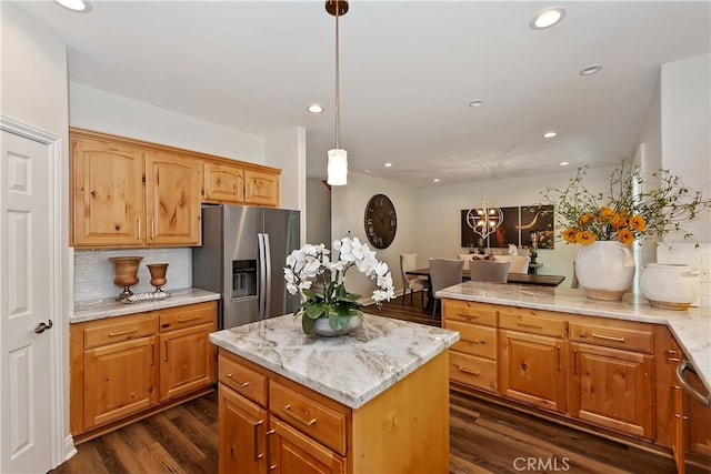 942 Lucerne Ln, Lake Arrowhead, CA 92352 - kitchen featuring stainless steel refrigerator with ice dispenser, dark wood-type flooring, tasteful backsplash, recessed lighting, and hanging light fixtures