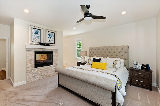 942 Lucerne Ln, Lake Arrowhead, CA 92352 - carpeted bedroom featuring a stone fireplace, baseboards, recessed lighting, and a ceiling fan