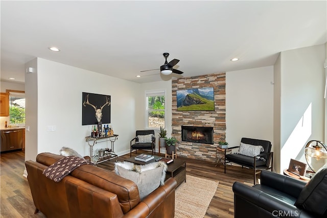 942 Lucerne Ln, Lake Arrowhead, CA 92352 - living area with ceiling fan, healthy amount of natural light, a stone fireplace, dark wood-type flooring, and recessed lighting