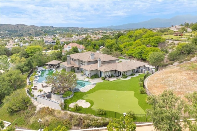 7 Olympic Way, Coto De Caza, CA 92679 - aerial perspective of suburban area featuring a pool area and a mountain backdrop