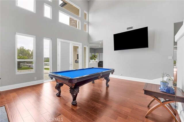 7 Olympic Way, Coto De Caza, CA 92679 - game room featuring wood finished floors, pool table, and a towering ceiling