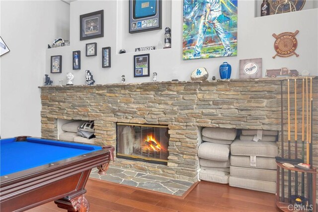 7 Olympic Way, Coto De Caza, CA 92679 - recreation room featuring wood finished floors, a stone fireplace, and billiards table