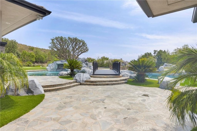 7 Olympic Way, Coto De Caza, CA 92679 - view of patio featuring an outdoor pool