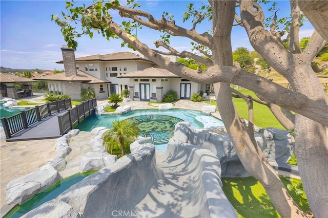 7 Olympic Way, Coto De Caza, CA 92679 - swimming pool with french doors and a patio