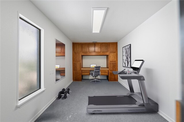 2712 Boundary Ln, Riverside, CA 92503 - exercise room with built in desk, carpet floors, and baseboards