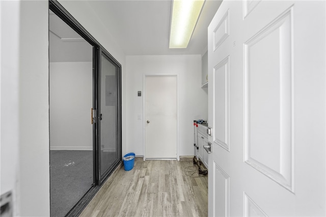 2712 Boundary Ln, Riverside, CA 92503 - washroom featuring light wood finished floors and baseboards
