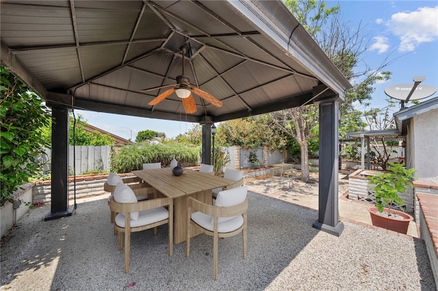 2712 Boundary Ln, Riverside, CA 92503 - fenced backyard with a gazebo, a patio, outdoor dining space, and a ceiling fan