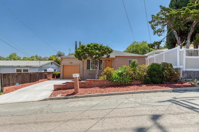 2033 Winnett St, San Diego, CA 92114 - view of front facade featuring an attached garage, concrete driveway, and stucco siding