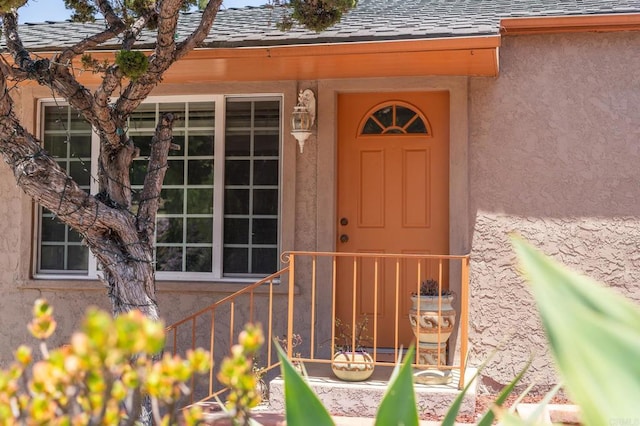 2033 Winnett St, San Diego, CA 92114 - doorway to property with stucco siding and roof with shingles