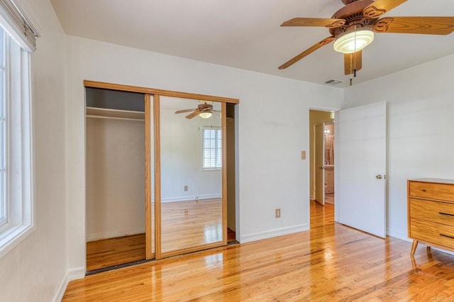 2033 Winnett St, San Diego, CA 92114 - unfurnished bedroom featuring light wood finished floors, a closet, and a ceiling fan