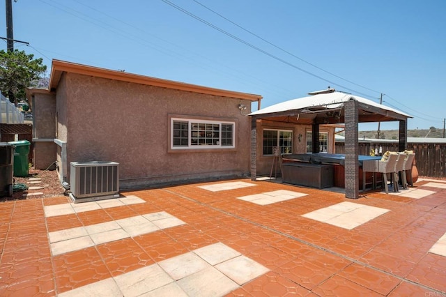 2033 Winnett St, San Diego, CA 92114 - view of patio / terrace with a hot tub and a gazebo