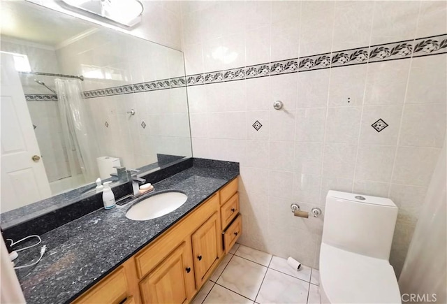 3855 Gilman Rd, El Monte, CA 91732 - full bath with tile walls, vanity, toilet, tile patterned floors, and shower / bath combo