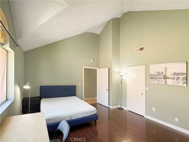 3855 Gilman Rd, El Monte, CA 91732 - bedroom with wood finished floors, baseboards, and high vaulted ceiling