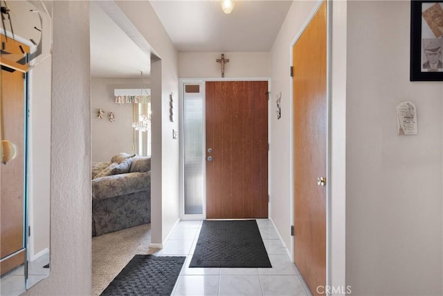 15506 Del Rey Dr, Victorville, CA 92395 - foyer entrance with baseboards and tile patterned floors
