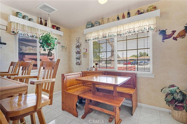 15506 Del Rey Dr, Victorville, CA 92395 - dining space with wallpapered walls and baseboards