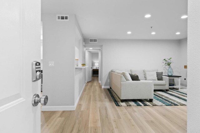 783 Brookstone Rd Unit 104, Chula Vista, CA 91913 - living room with wood finished floors and recessed lighting