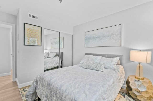 783 Brookstone Rd Unit 104, Chula Vista, CA 91913 - bedroom with wood finished floors and a closet