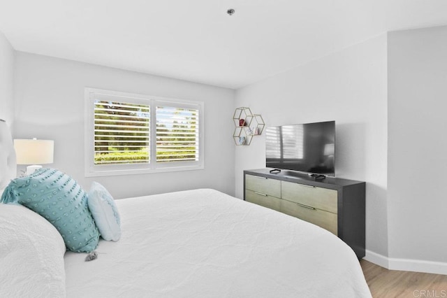 783 Brookstone Rd Unit 104, Chula Vista, CA 91913 - bedroom featuring wood finished floors and baseboards