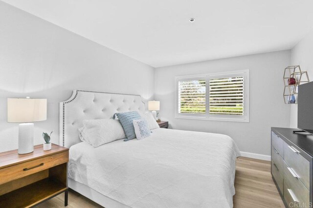 783 Brookstone Rd Unit 104, Chula Vista, CA 91913 - bedroom with wood finished floors and baseboards