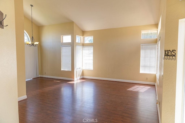 27474 Bolandra Ct, Temecula, CA 92591 - empty room with a chandelier, plenty of natural light, and hardwood / wood-style flooring