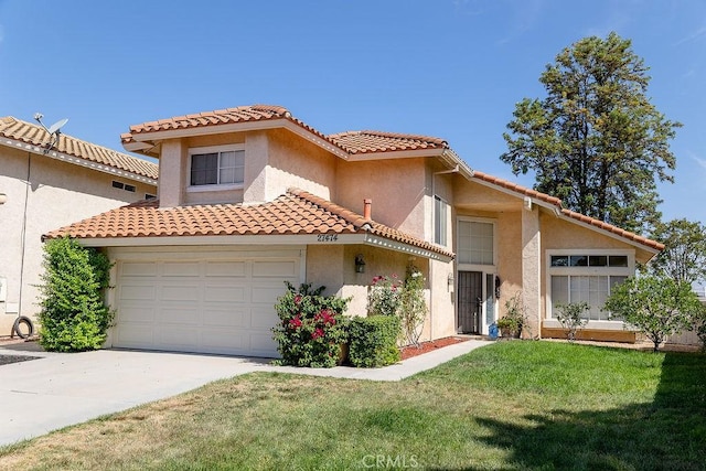 27474 Bolandra Ct, Temecula, CA 92591 - mediterranean / spanish-style house featuring stucco siding, driveway, a front lawn, a tile roof, and an attached garage