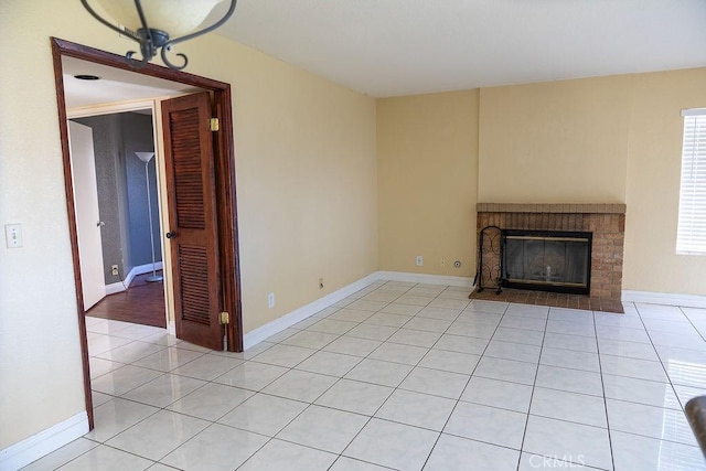 27474 Bolandra Ct, Temecula, CA 92591 - unfurnished living room with light tile patterned floors and a fireplace