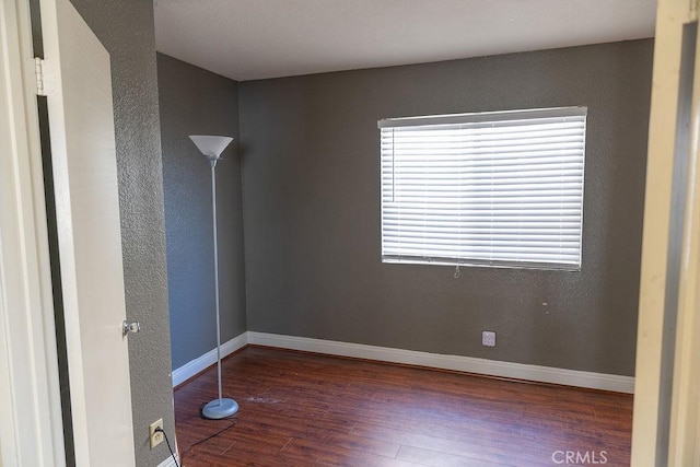27474 Bolandra Ct, Temecula, CA 92591 - empty room featuring wood finished floors and a textured wall
