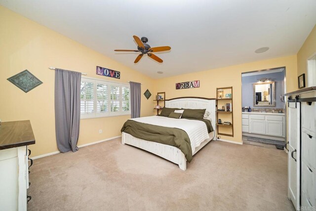 1064 Eliot St, Oceanside, CA 92057 - bedroom featuring light colored carpet, lofted ceiling, connected bathroom, and ceiling fan