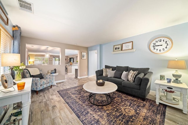 1064 Eliot St, Oceanside, CA 92057 - living area with wood finished floors