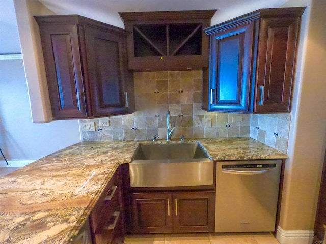 1200 N Harbor Dr Unit 15B, Oceanside, CA 92054 - kitchen with stainless steel dishwasher, tasteful backsplash, and light stone counters