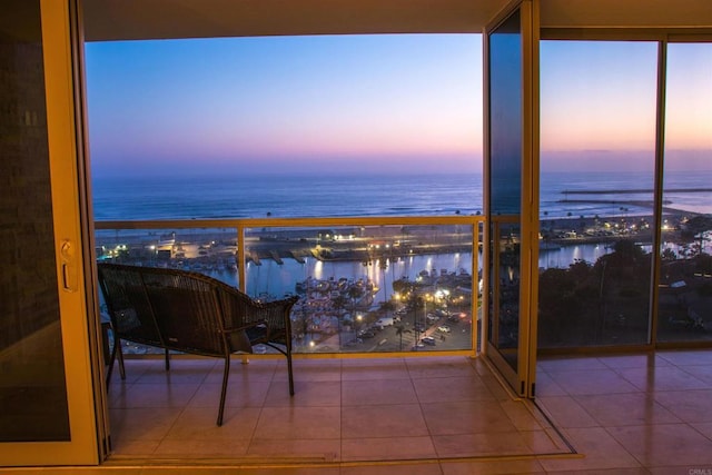 1200 N Harbor Dr Unit 15B, Oceanside, CA 92054 - balcony at dusk with a water view